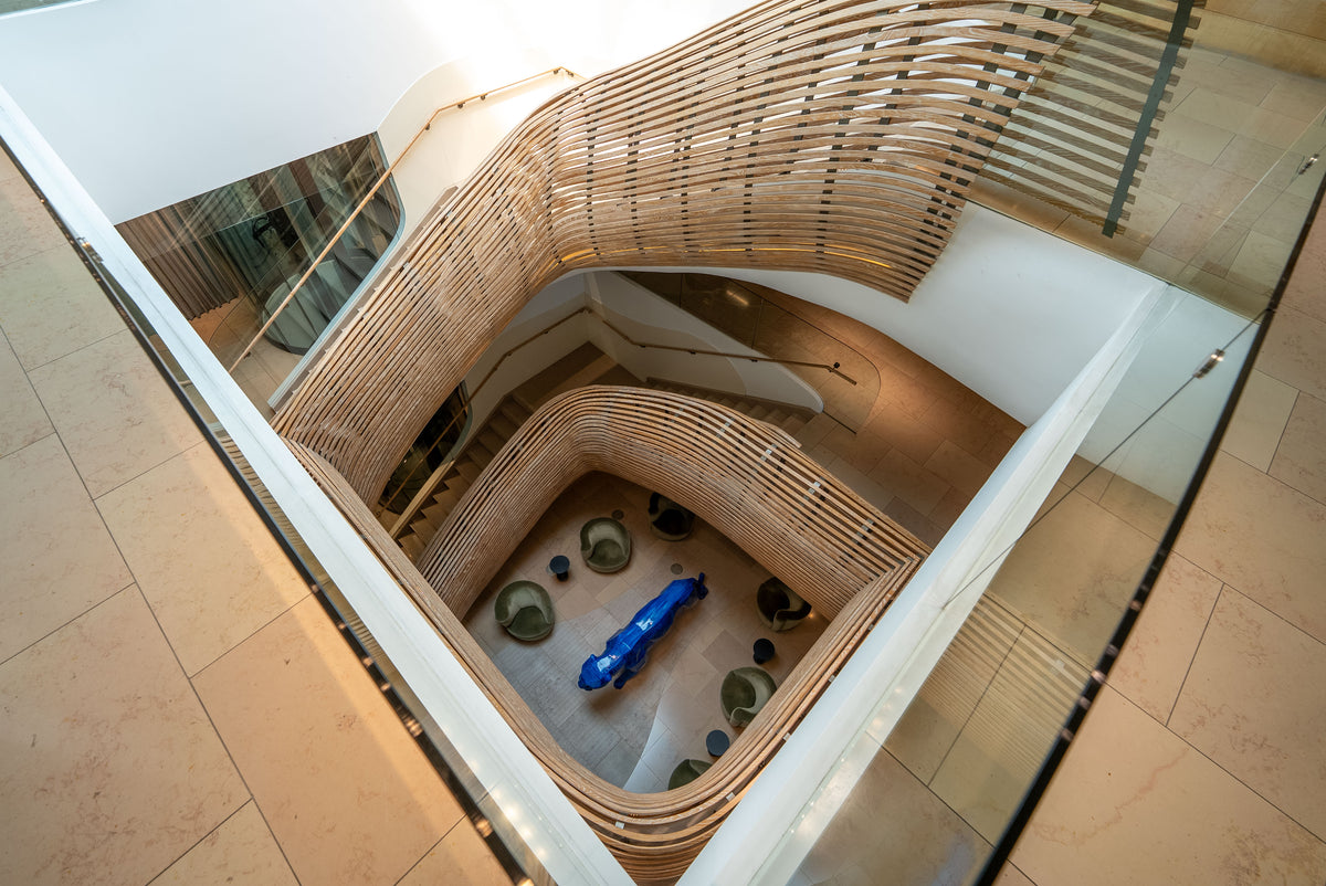 ARC Beverly Hills atrium seen from above with a Richard Orlinski sculpture